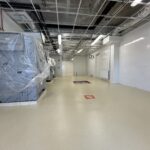 Revêtement de sol lingerie cuisine métacrylathe Flowfast Flowcrete résine étanchéité l